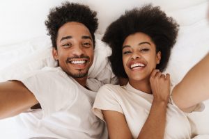 Beautiful happy young african couple relaxing