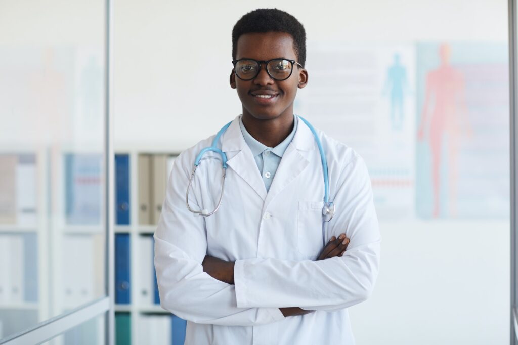 Young African Doctor Posing in Clinic